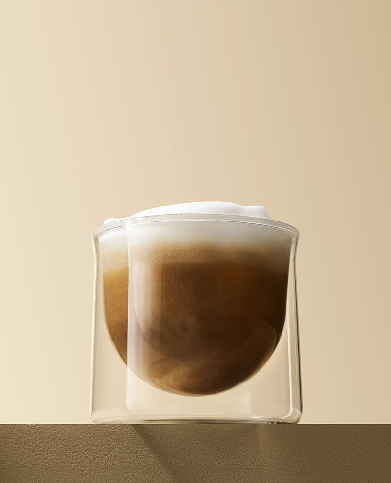 Espresso with steamed milk and a thick layer of foam